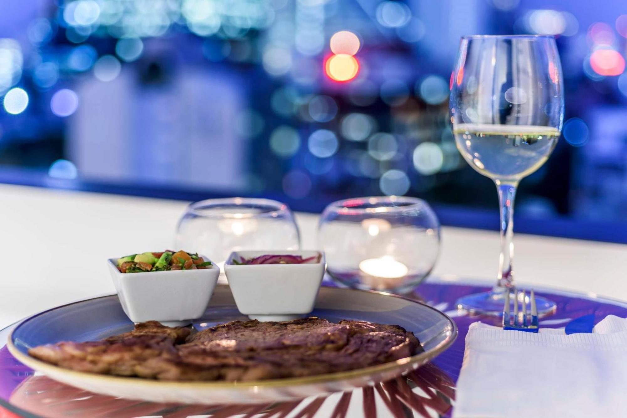 Nh Collection Mexico City Reforma Exterior photo A glass of white wine with a meal
